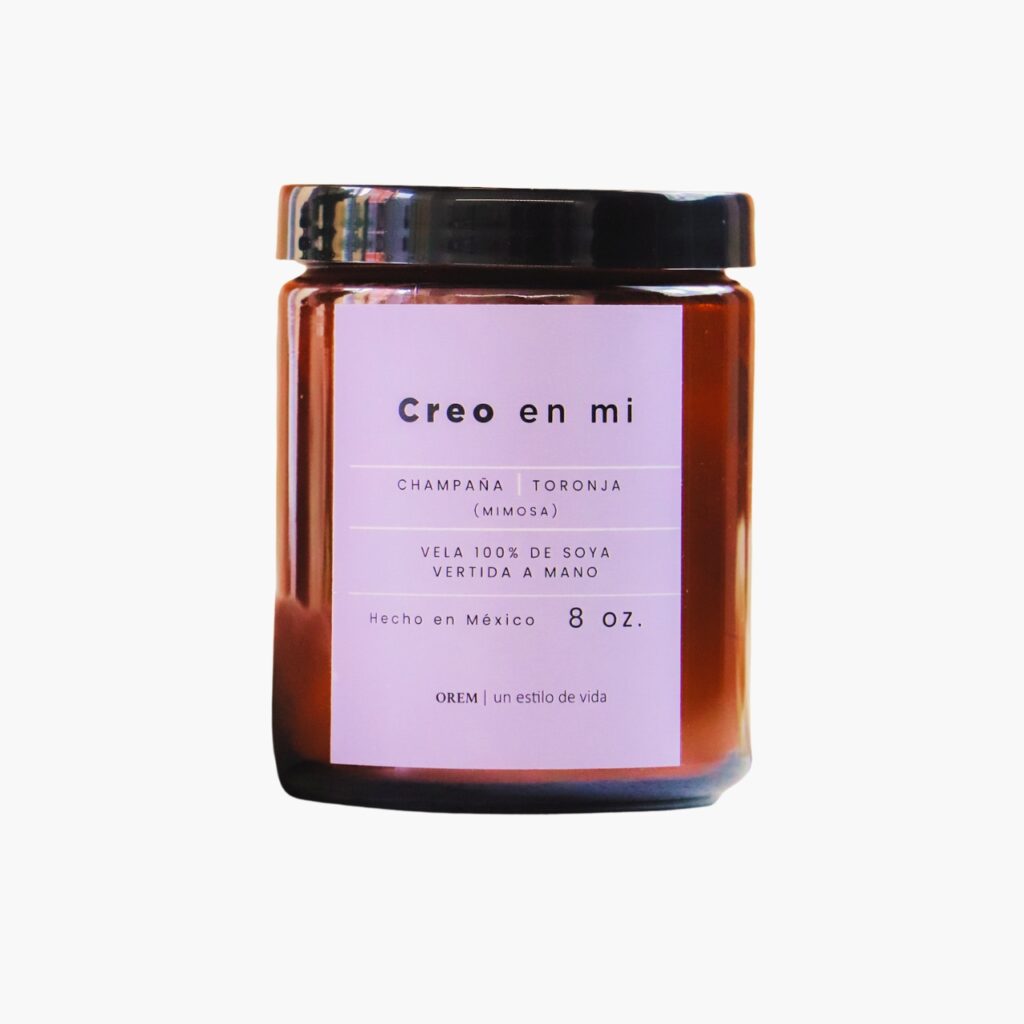 Vela aromática de soya OREM Creo en mí con aroma champaña y toronja en envase ámbar de 8 oz