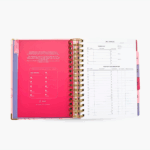 Planner de viajes en agenda Planifesting 2026 rosa con flores