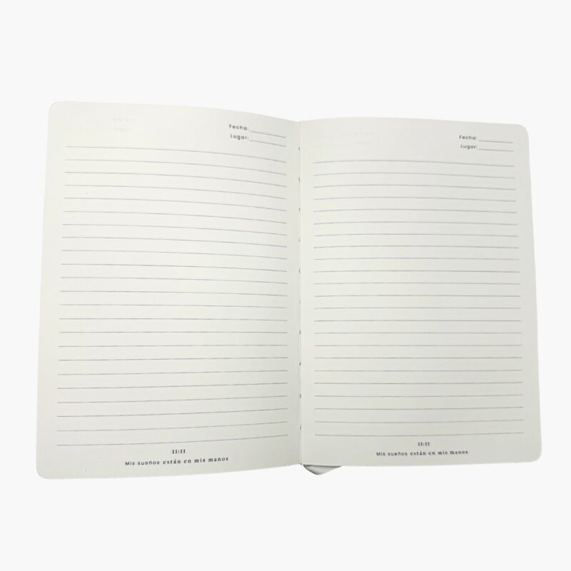 Hojas interiores de la libreta con espacio amplio para escribir, secciones de fecha y lugar, y frase inspiradora en la parte inferior.